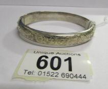 A silver bangle, Birmingham 1962, maker S & B,