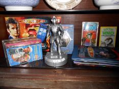 A collection of Doctor Who items including books,