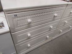 A white 3 drawer chest