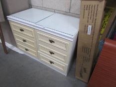2 white bedside chests