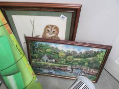 A framed and glazed owl tapestry and one other