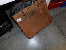 A leather satchel etc
