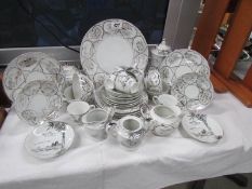 Approximately 32 pieces of oriental tea ware