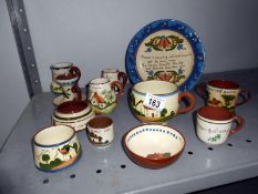 A mixed lot of Torquay pottery motto ware