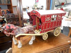 A model gypsy caravan and horse