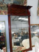 A mahogany framed mirror,