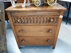 A Priory style oak dressing table