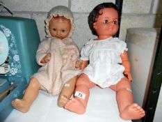 2 vintage dolls