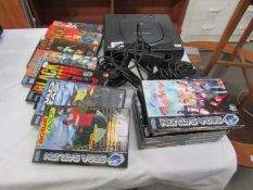 A Sega Saturn console and games