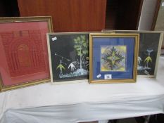 A pair of African scene framed and glazed prints and 2 framed and glazed fabric pictures