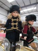 2 porcelain dolls in Russian costume