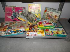 A quantity of vintage jigsaw puzzles