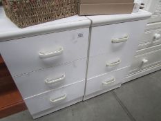2 white bedside chests