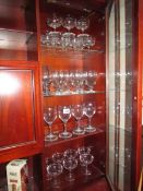 4 shelves of assorted drinking glasses