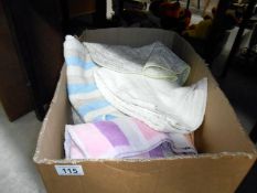 A box of assorted linen and towels