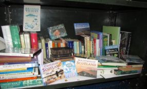 A shelf of books including nature