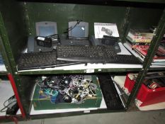 A mixed lot of computer keyboards, mouse, telephones etc,