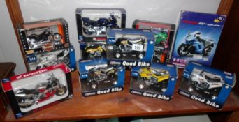 A quantity of boxed die cast motor cycles