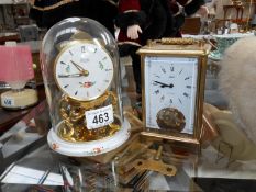 An anniversary clock and a carriage clock