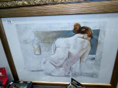 A framed and glazed signed print of a semi nude woman