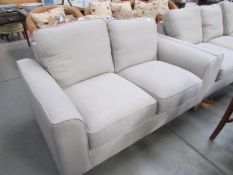 A superb quality beige 2 seater sofa