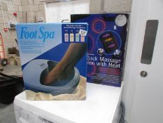 A back massage cushion and a foot spa