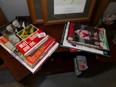 A quantity of football books and magazines