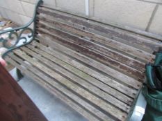 A wood and metal garden bench