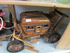 A hand made wooden stage coach