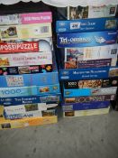 A large quantity of jigsaw puzzles