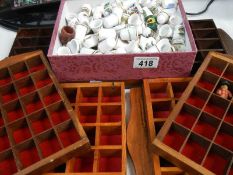 A collection of thimbles with racks