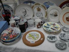 A large quantity of RAF and Winston Churchill collectors plates and mugs including Wedgwood,