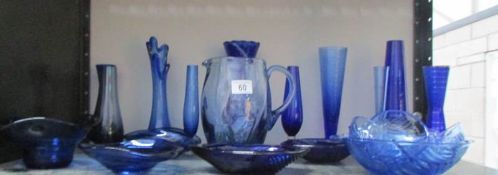 20 pieces of blue glass ware