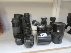 A quantity of assorted 35mm lenses