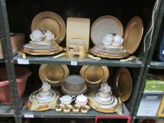 2 shelves of gold decorated table ware and other items