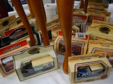 A quantity of boxed Lledo die cast models