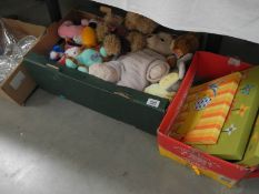 A box of soft toys and a box of pictures