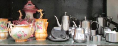 A mixed lot of stainless steel and pottery items