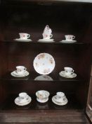 33 pieces of floral patterned tea ware