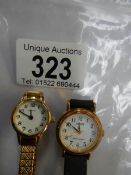 A Sekonda wrist watch and a Lorus wrist watch