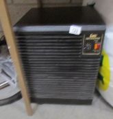 A dehumidifier with castors and liner