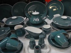 A quantity of Poole pottery table ware