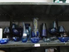 22 pieces of blue glass ware