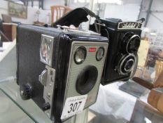 A Kodak box camera and a Lobital camera