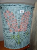 A cane linen bin