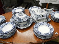 A large quantity of blue and white dinner ware,