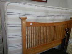 A double bed with headboard