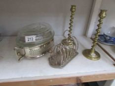 A pair of brass candlesticks,