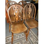 4 old wheel back chairs