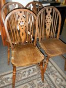 4 old wheel back chairs